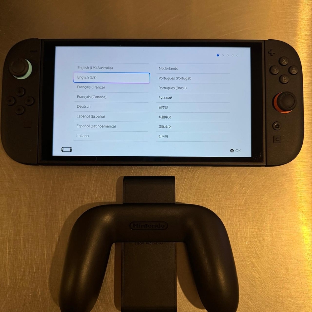 Nintendo Switch with Black and Red Controllers